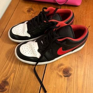 Jordan 1s low black and white red men size 9